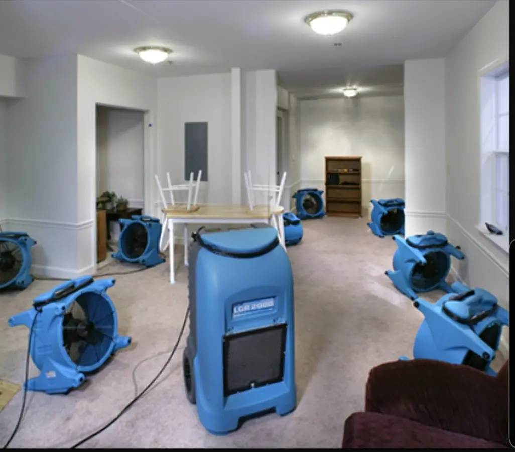 Air movers and dehumidifier setup for Water Damage Restoration in Kenner